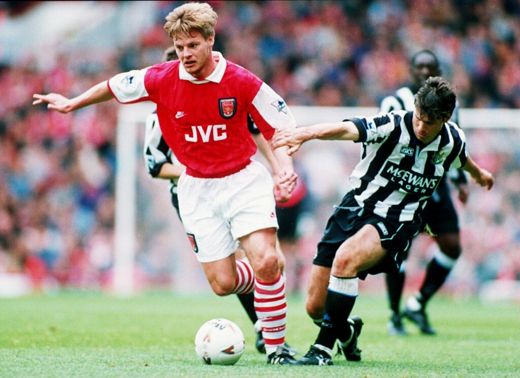 18 SEP 1994: STEFAN SCHWARZ OF ARSENAL SOCCER CLUB IS CHASED BY ROBERT LEE OF NEWCASTLE SOCCER CLUB DURING THEIR MATCH AT ARSENAL. Mandatory Credit: Ben Radford/ALLSPORT