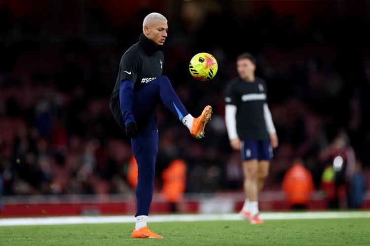 LONDON, ENGLAND: Richarlison of Tottenham Hotspur warms up prior to the Premier League match between Arsenal and Tottenham Hotspur at Emirates Stad...