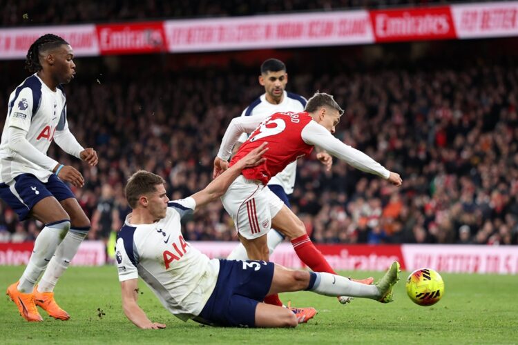 LONDON, ENGLAND: Leandro Trossard of Arsenal scores his team's first goal during the Premier League match between Arsenal and Tottenham Hotspur at ...