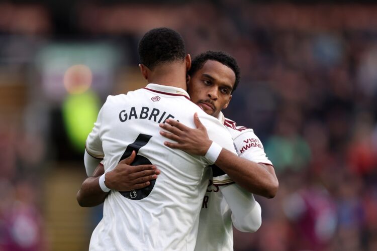 BURNLEY, ENGLAND: Jurrien Timber and Gabriel of Arsenal embrace prior to the Premier League match between Burnley and Arsenal at Turf Moor on Novem...