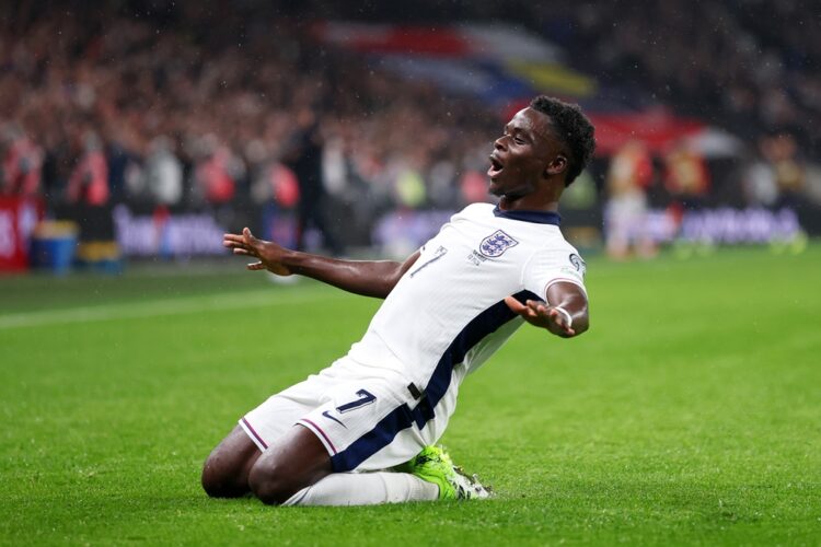 LONDON, ENGLAND: Bukayo Saka of England celebrates scoring his team's first goal during the FIFA World Cup 2026 qualifier match between England and...