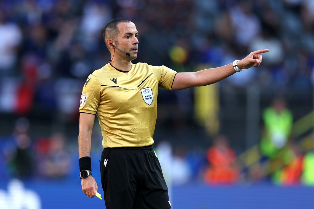 Arsenal v Bayern Munich referee announced 4 DORTMUND, GERMANY: Referee Marco Guida gestures during the UEFA EURO 2024 group stage match between France and Poland at Football Stadium Dortmund on June 25, 2024. (Photo by Kevin C. Cox/Getty Images)