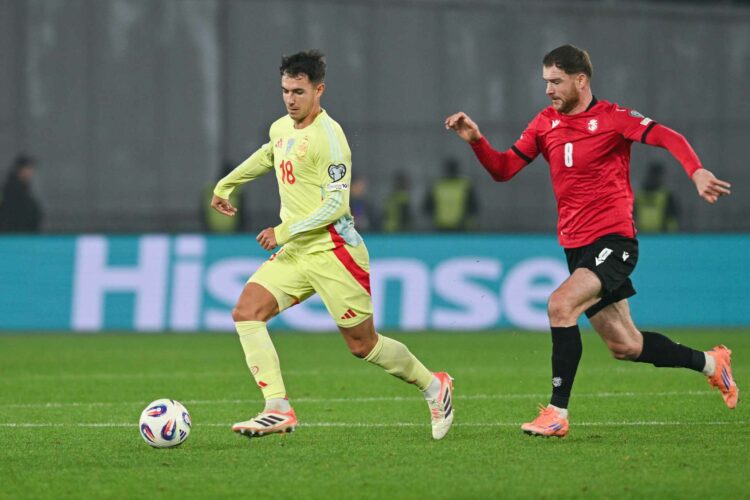 TBILISI, GEORGIA - NOVEMBER 15: Martin Zubimendi of Spain in action against Budu Zivzivadze of Georgia during the FIFA World Cup 2026 qualifier mat...
