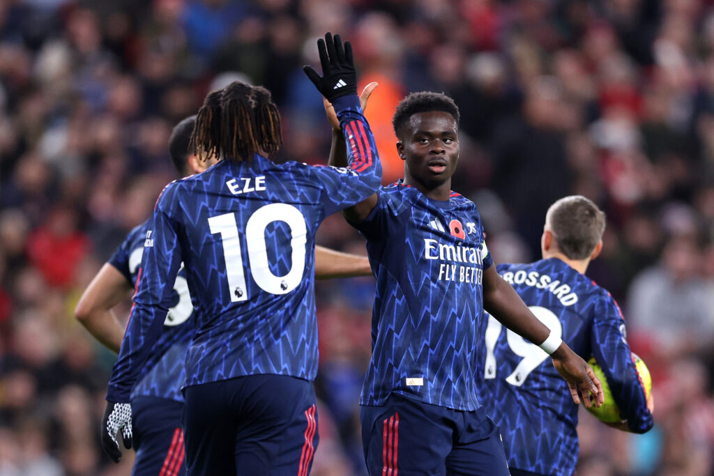 SUNDERLAND, ENGLAND - NOVEMBER 08: Bukayo Saka of Arsenal celebrates scoring his team's first goal with teammate Eberechi Eze during the Premier League match between Sunderland and Arsenal at the Stadium of Light on November 08, 2025 in Sunderland, England. (Photo by Alex Livesey/Getty Images)