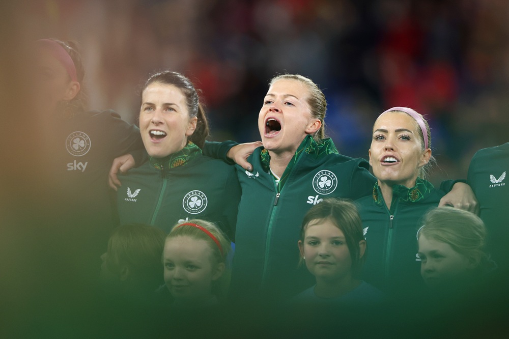 CARDIFF, WALES: Ruesha Littlejohn of Republic of Ireland (C) lines up with teammates and sings the national anthem prior to the UEFA Women's EURO 2025 Play-Off Round Two First Leg match between Wales and Republic of Ireland at Cardiff City Stadium on November 29, 2024. (Photo by Michael Steele/Getty Images)