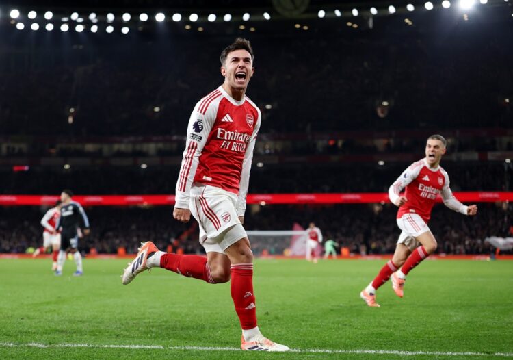 Martin Zubimendi of Arsenal celebrates scoring his team's second goal during the Premier League match between Arsenal and Aston Villa at Emirates S...