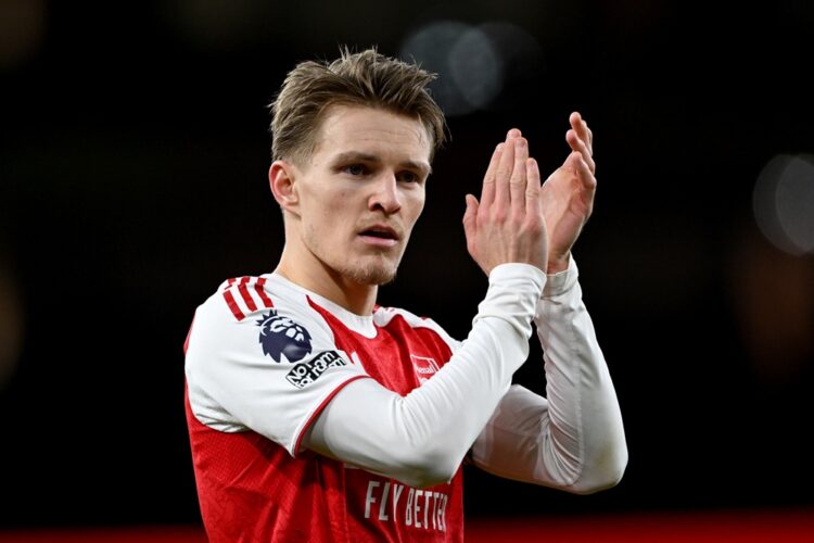Martin Odegaard of Arsenal applauds the fans after the Premier League match between Arsenal and Brighton & Hove Albion at the Emirates Stadium on D...