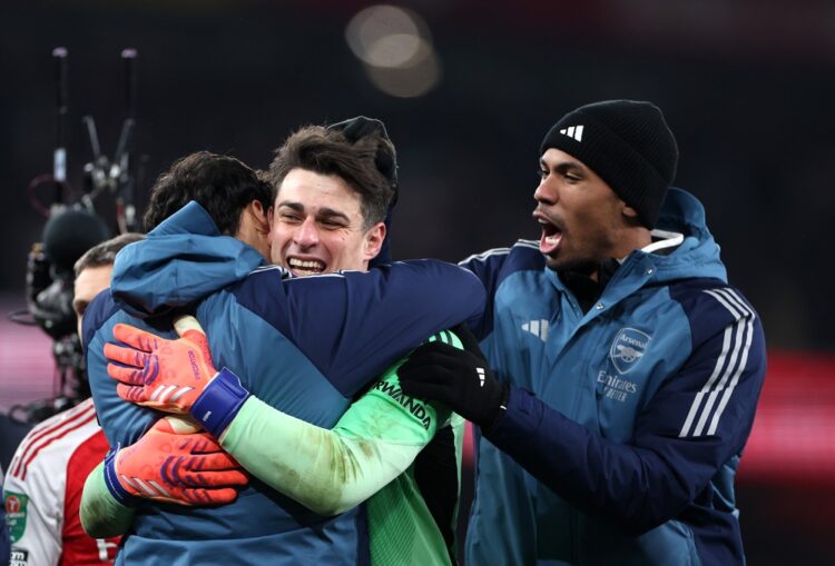 Kepa Arrizabalaga of Arsenal is congratulated by his teammates following victory in the Carabao Cup Quarter Final match between Arsenal and Crystal...