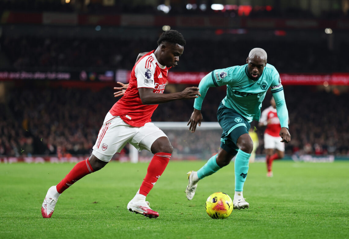 Everton player argues Saka is 'not skilful' 1 LONDON, ENGLAND - DECEMBER 13: Bukayo Saka of Arsenal is challenged by Toti Gomes of Wolverhampton Wanderers during the Premier League match betwee...