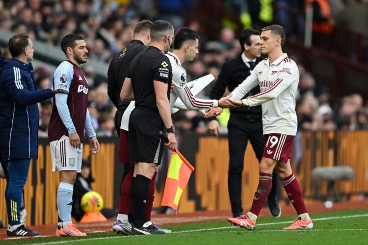 BIRMINGHAM, ENGLAND: Leandro Trossard of Arsenal (R) is substituted off for Gabriel Martinelli after coming on as a substitute during the Premier L...