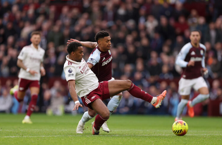 BIRMINGHAM, ENGLAND - DECEMBER 06: Jurrien Timber of Arsenal and Ollie Watkins of Aston Villa battle for possession during the Premier League match...
