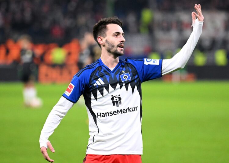 HAMBURG, GERMANY: Fabio Vieira of Hamburger SV celebrates scoring his team's second goal during the Bundesliga match between Hamburger SV and VfB S...