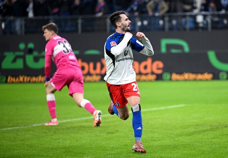 HAMBURG, GERMANY: Fabio Vieira of Hamburger SV celebrates scoring his team's second goal during the Bundesliga match between Hamburger SV and VfB S...