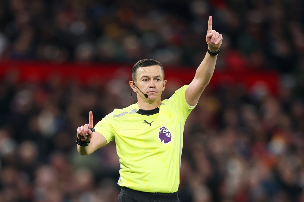 MANCHESTER, ENGLAND: Referee Tony Harrington gestures during the Premier League match between Manchester United and Everton at Old Trafford on November 24, 2025. (Photo by Carl Recine/Getty Images)