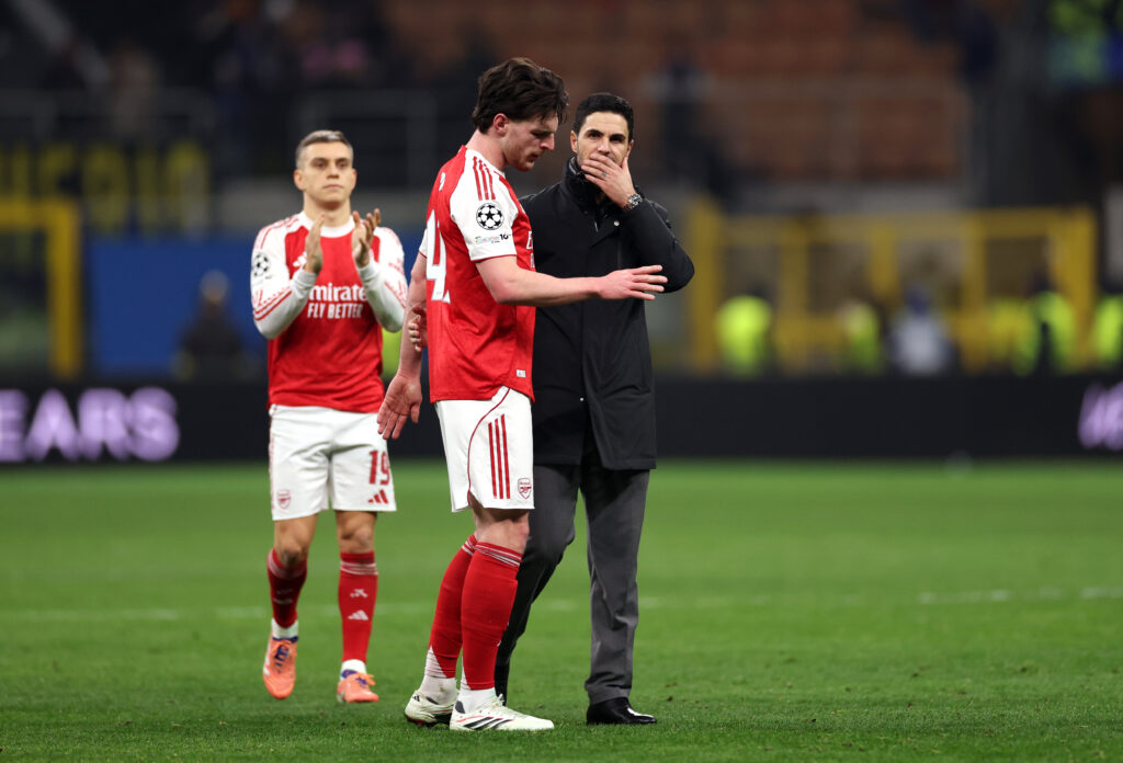 MILAN, ITALY - JANUARY 20: Mikel Arteta, Manager of Arsenal, interacts with Declan Rice of Arsenal following the UEFA Champions League 2025/26 League Phase MD7 match between FC Internazionale Milano and Arsenal FC at Stadio San Siro on January 20, 2026 in Milan, Italy. (Photo by Carl Recine/Getty Images)