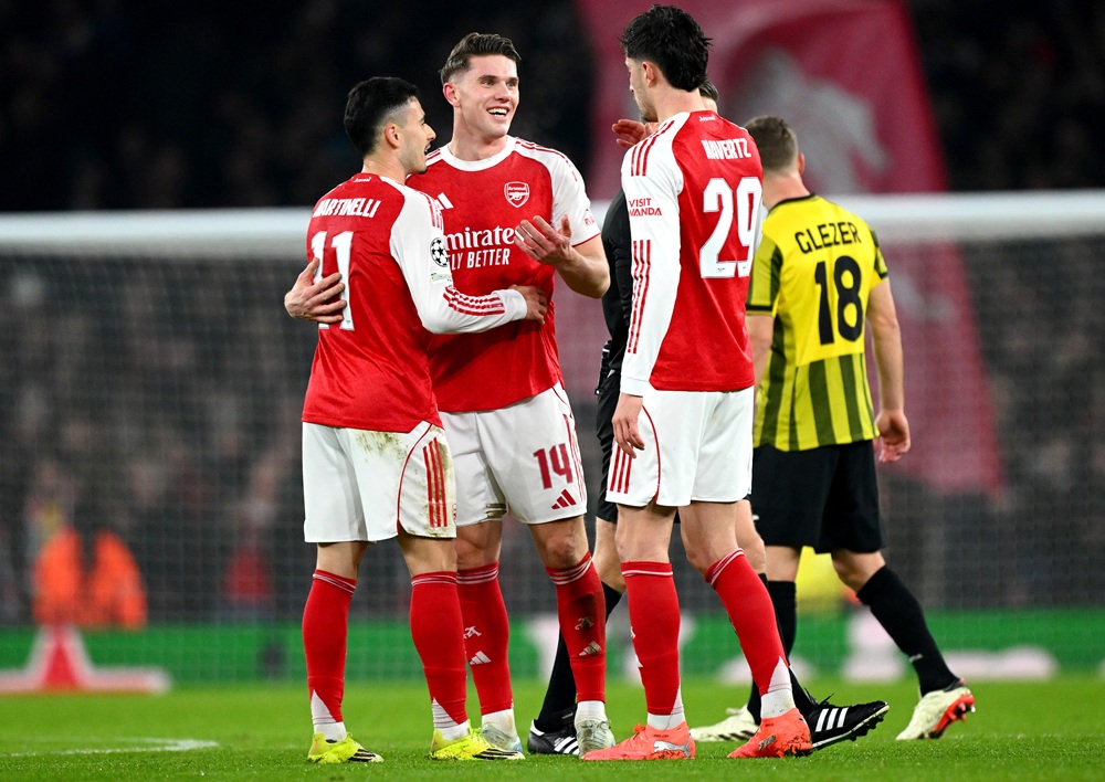 Gabriel Martinelli of Arsenal celebrates scoring his team's third goal with teammates Viktor Gyoekeres and Kai Havertz during the UEFA Champions League 2025/26 League Phase MD8 match between Arsenal FC and FC Kairat Almaty at Arsenal Stadium on January 28, 2026 in London, England. (Photo by Clive Mason/Getty Images)