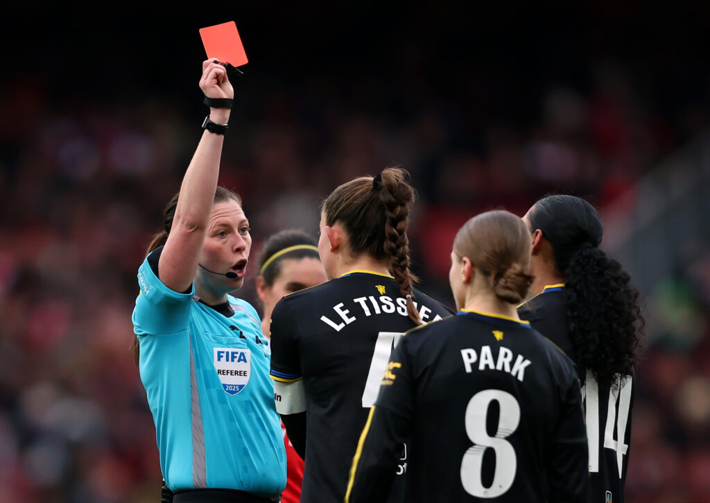 LONDON, ENGLAND - JANUARY 10: Referee Abigail Byrne shows a red card to Jayde Riviere of Manchester United (obscured) during the Barclays Women's Super League match between Arsenal and Manchester United at Emirates Stadium on January 10, 2026 in London, England. (Photo by Tom Dulat/Getty Images)