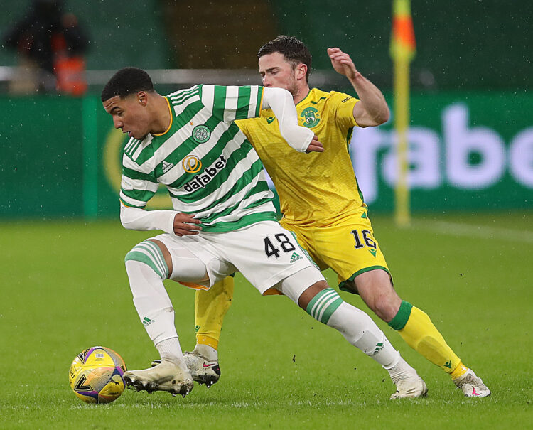GLASGOW, SCOTLAND - JANUARY 11: Armstrong Okoflex of Celtic vies with Lewis Stevenson of Hibernian during the Ladbrokes Scottish Premiership match ...