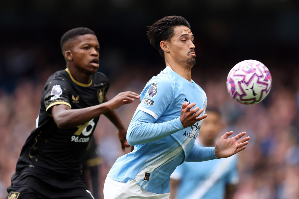 MANCHESTER, ENGLAND - SEPTEMBER 27: Tijjani Reijnders of Manchester City controls the ball under pressure from Florentino Luis of Burnley during the Premier League match between Manchester City and Burnley at Etihad Stadium on September 27, 2025 in Manchester, England. (Photo by Matt McNulty/Getty Images)
