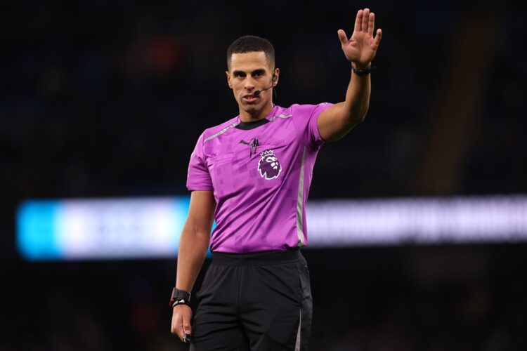 Referee Farai Hallam gestures during the Premier League match between Manchester City and Wolverhampton Wanderers at Etihad Stadium on January 24, ...