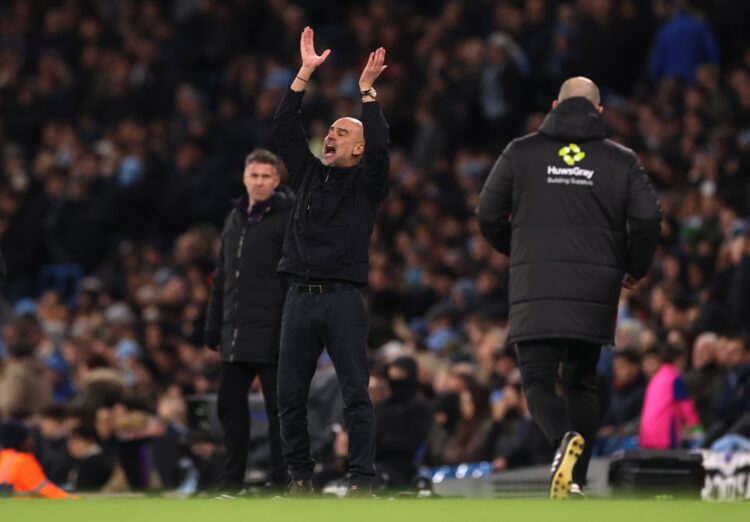 Pep Guardiola, Manager of Manchester City, reacts during the Premier League match between Manchester City and Wolverhampton Wanderers at Etihad Sta...