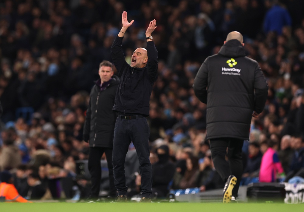 Pep Guardiola, Manager of Manchester City, reacts during the Premier League match between Manchester City and Wolverhampton Wanderers at Etihad Sta...