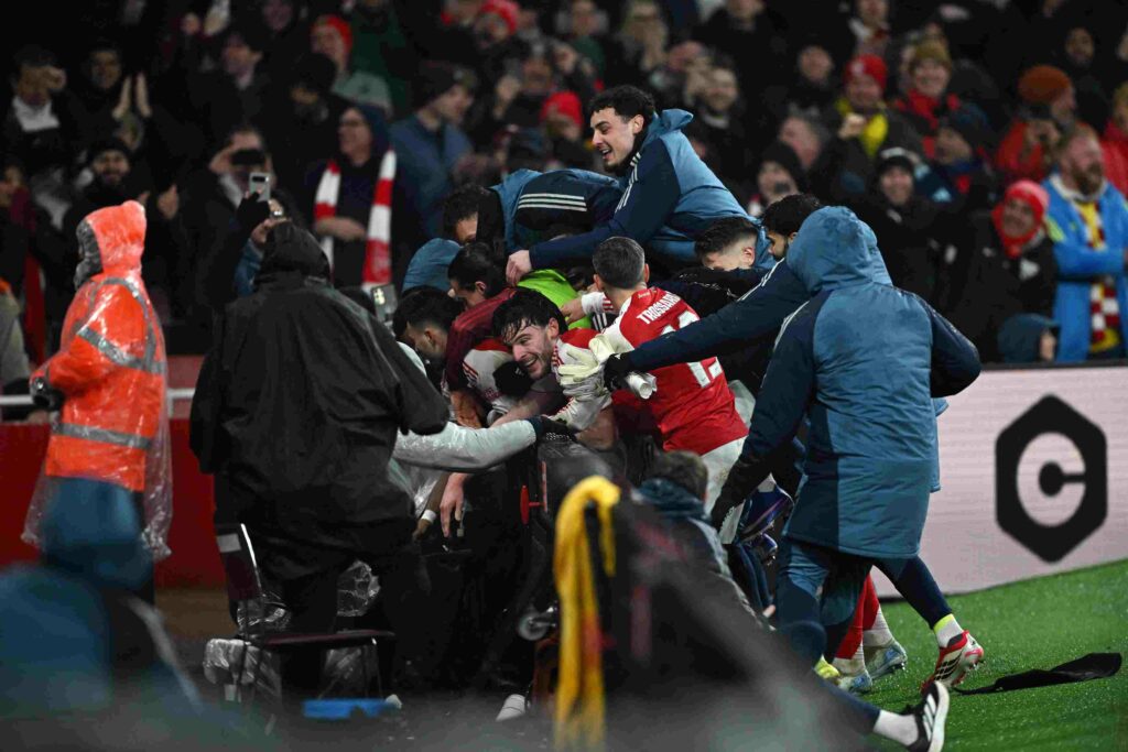 LONDON, ENGLAND - FEBRUARY 03: Kai Havertz of Arsenal (obscured) celebrates scoring his team's first goal with teammates during the Carabao Cup Semi Final Second Leg match between Arsenal and Chelsea at Emirates Stadium on February 03, 2026 in London, England. (Photo by Mike Hewitt/Getty Images)