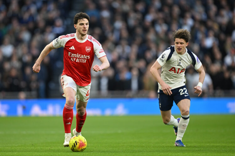 Declan Rice of Arsenal gets away from Conor Gallagher of Tottenham Hotspur during the Premier League match between Tottenham Hotspur and Arsenal at...