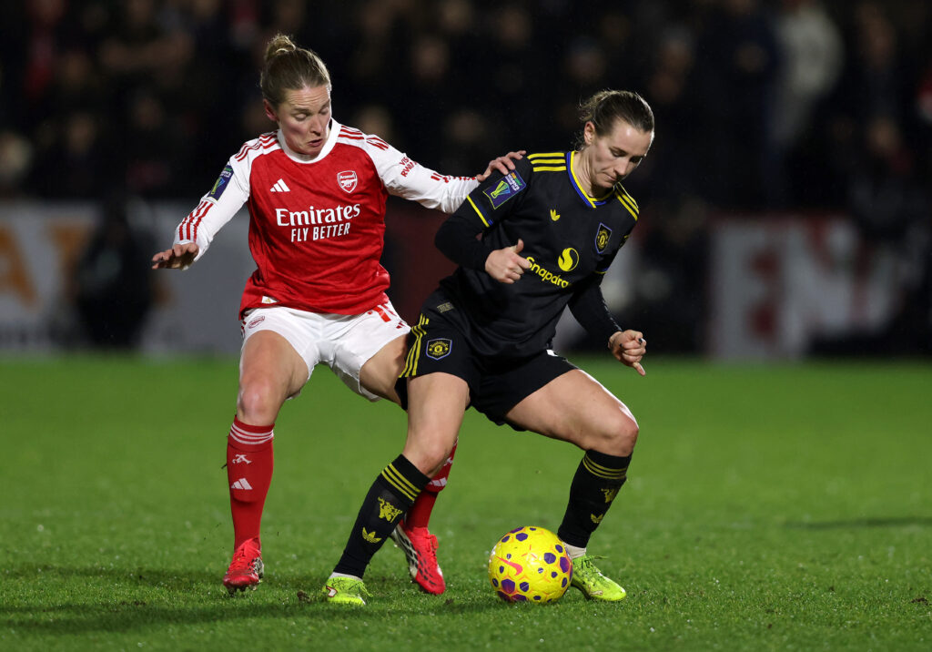 BOREHAMWOOD, ENGLAND - JANUARY 21: Kim Little of Arsenal and Lisa Naalsund of Manchester United battle for possession during the Subway Women's League Cup Semi Final match between Arsenal and Manchester United at Mangata Pay UK Stadium on January 21, 2026 in Borehamwood, England. (Photo by Paul Harding/Getty Images)