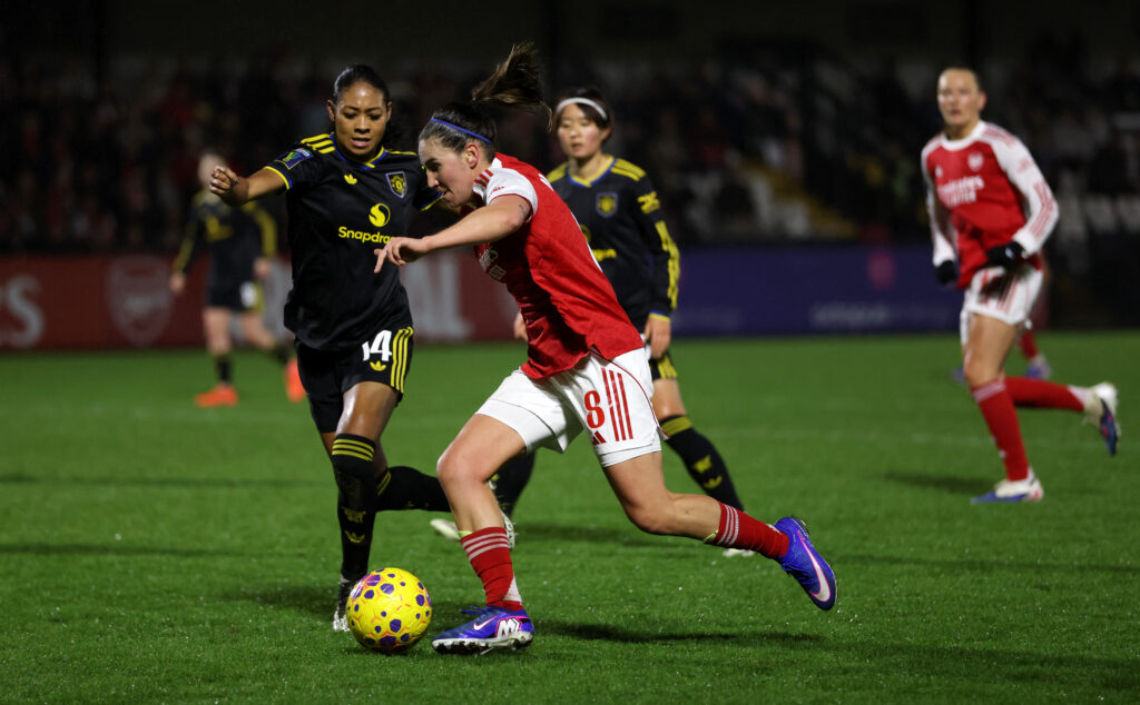 BOREHAMWOOD, ENGLAND - JANUARY 21: Mariona Caldentey of Arsenal and Jayde Riviere of Manchester United battle for possession during the Subway Women's League Cup Semi Final match between Arsenal and Manchester United at Mangata Pay UK Stadium on January 21, 2026 in Borehamwood, England. (Photo by Paul Harding/Getty Images)