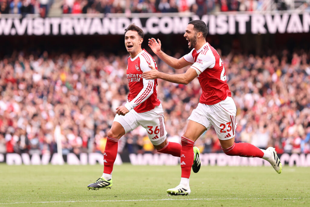 Mikel Merijo celebrates with Martin Zubimendi after the latter scored for Arsenal