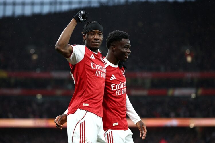 LONDON, ENGLAND: Noni Madueke of Arsenal celebrates scoring his team's first goal with teammate Bukayo Saka during the Emirates FA Cup Fourth Round...