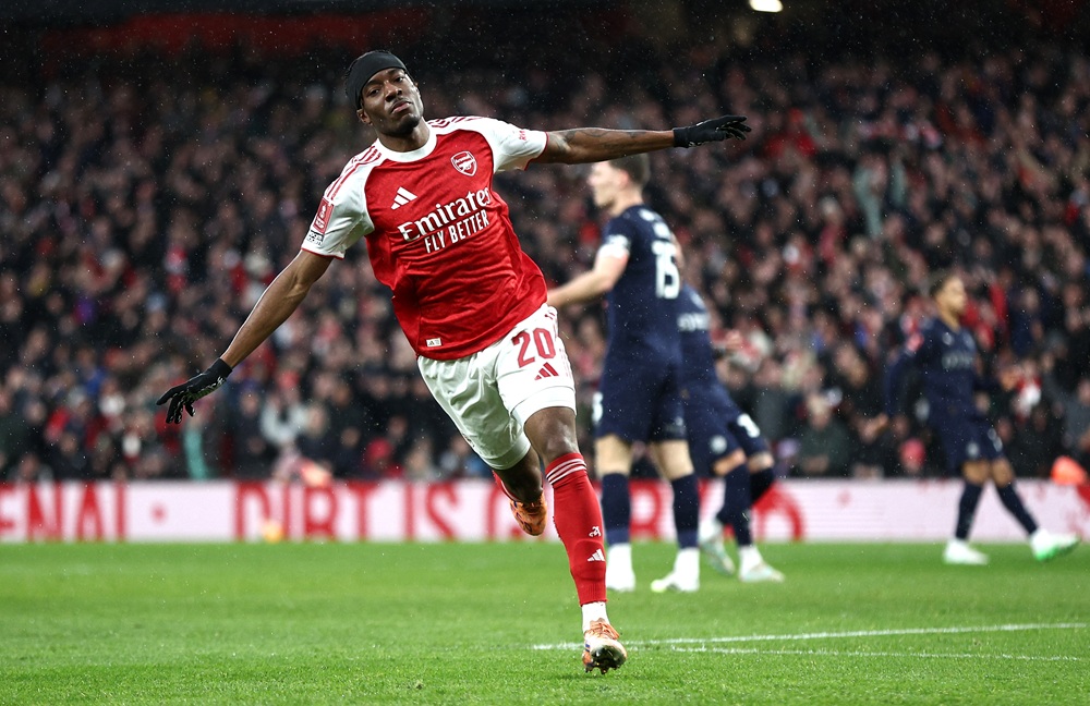 Noni Madueke of Arsenal celebrates scoring his team's first goal during the Emirates FA Cup Fourth Round match between Arsenal and Wigan Athletic o...