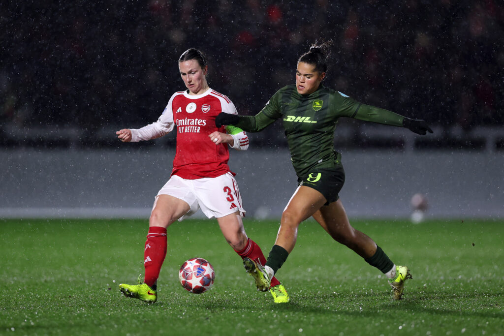 BOREHAMWOOD, ENGLAND - FEBRUARY 18: Lotte Wubben-Moy of Arsenal is challenged by Jada Conijnenberg of OH Leuven during the UEFA Women's Champions League 2025/26 KO play-offs Second Leg match between Arsenal Women FC and OH Leuven at Meadow Park on February 18, 2026 in Borehamwood, England. (Photo by Justin Setterfield/Getty Images)