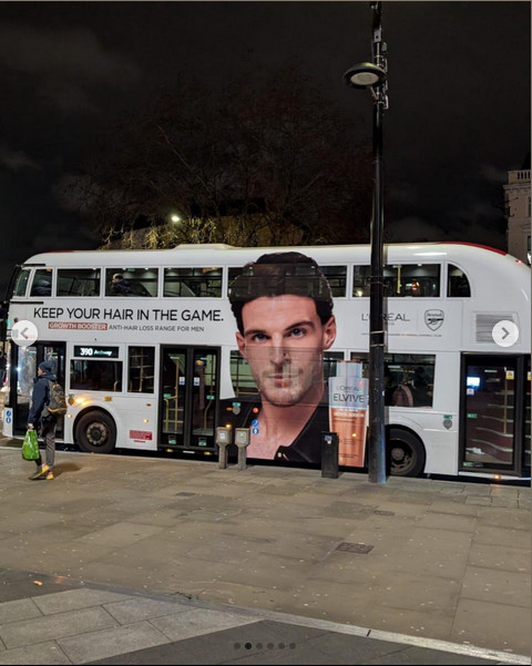 Bus with L'Oreal advert featuring Declan Rice