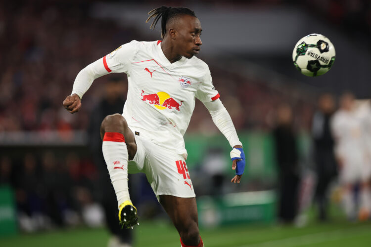 MUNICH, GERMANY - FEBRUARY 11: Yan Diomande of RB Leipzig controls the ball during the DFB Cup Quarter Final match between FC Bayern München and RB...
