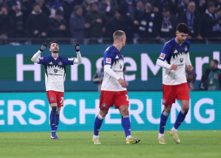 Fabio Vieira of Hamburger SV celebrates scoring his team's first goal during the Bundesliga match between Hamburger SV and FC Bayern München at Vol...