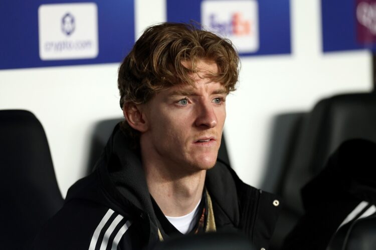 Anthony Gordon of Newcastle United looks on from the substitutes bench prior to the UEFA Champions League 2025/26 League Knockout Play-off Second L...