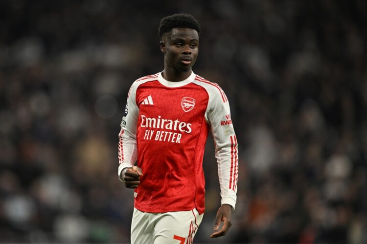 Bukayo Saka of Arsenal looks on during the Premier League match between Tottenham Hotspur and Arsenal at Tottenham Hotspur Stadium on February 22, ...