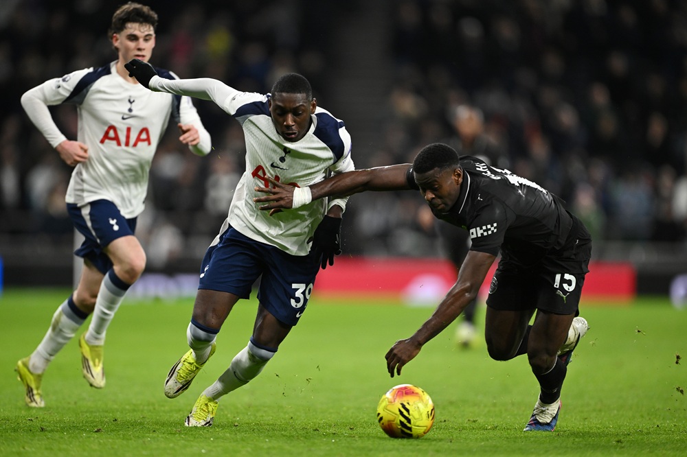 Marc Guehi of Manchester City battles for possession with Randal Kolo Muani of Tottenham Hotspur during the Premier League match between Tottenham ...