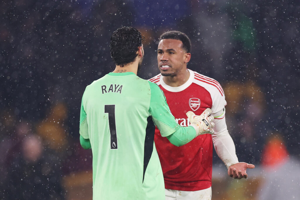 WOLVERHAMPTON, ENGLAND - FEBRUARY 18: David Raya and Gabriel of Arsenal clash after Tom Edozie of Wolverhampton Wanderers (not pictured) scores his team's second goal during the Premier League match between Wolverhampton Wanderers and Arsenal at Molineux on February 18, 2026 in Wolverhampton, England. (Photo by Carl Recine/Getty Images)