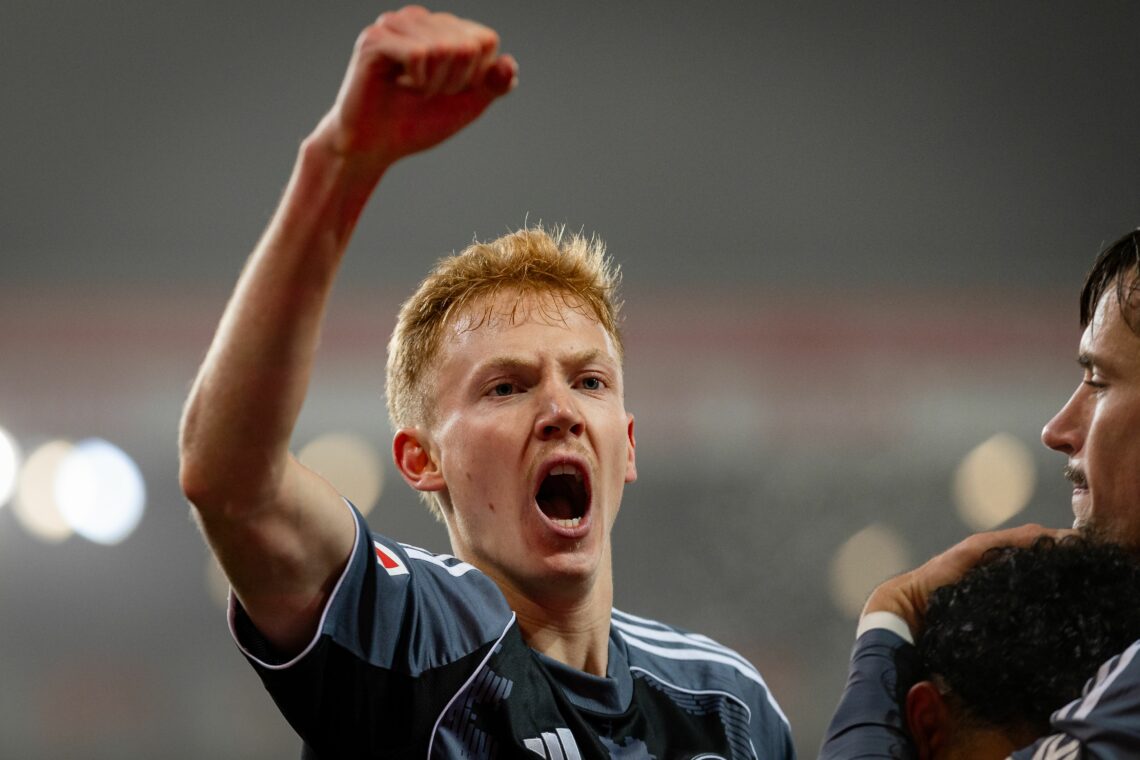 BERLIN, GERMANY - FEBRUARY 06: Hugo Larsson of Eintracht Frankfurt celebrates teammate Nathaniel Brown's goal to set the score 0-1 during the Bunde...