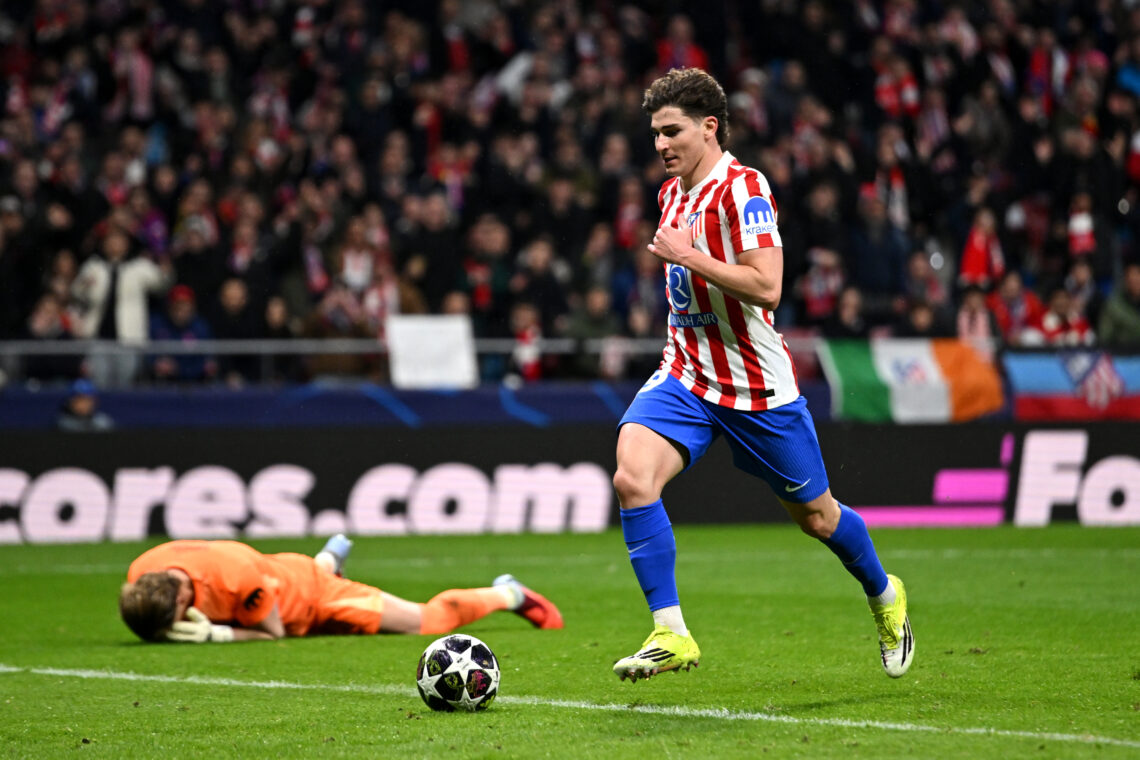Julian Alvarez of Atletico de Madrid scores his team's third goal, as Antonin Kinsky of Tottenham Hotspur looks dejected during the UEFA Champions ...