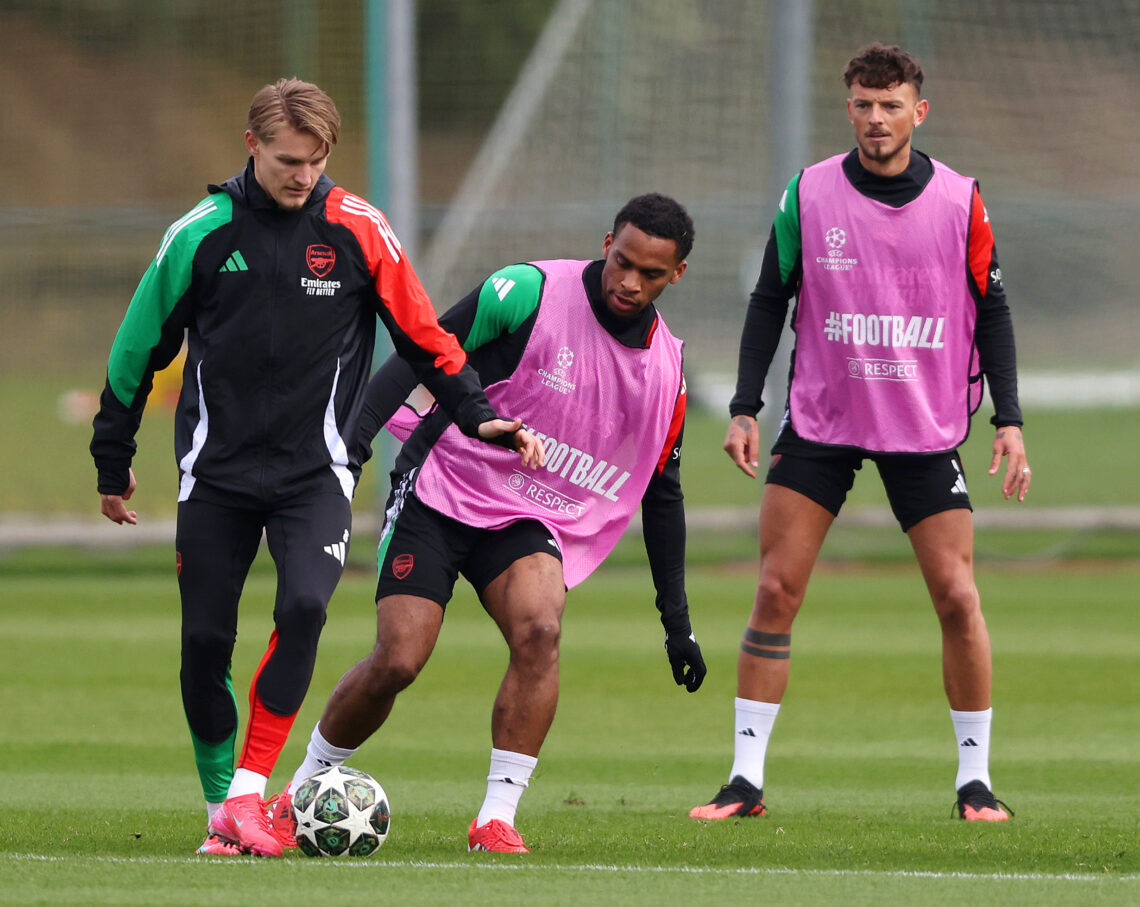 Jurrien Timber hustles Martin Odegaard in Arsenal training
