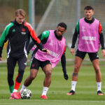Jurrien Timber hustles Martin Odegaard in Arsenal training