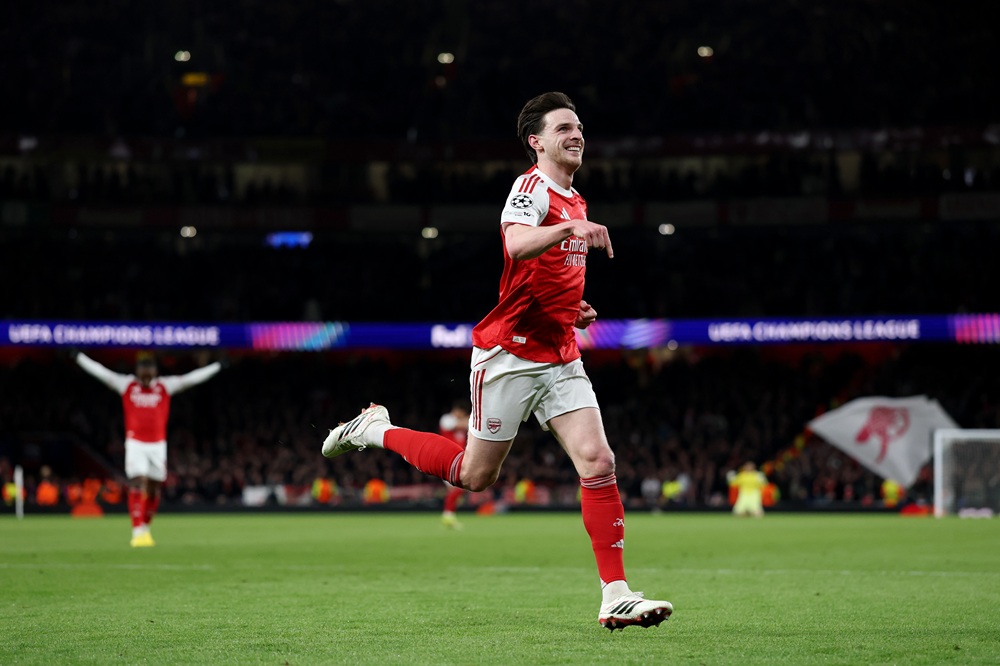 Declan Rice of Arsenal celebrates scoring his team's second goal during the UEFA Champions League 2025/26 Round of 16 Second Leg match between Arsenal FC and Bayer 04 Leverkusen at Arsenal Stadium on March 17, 2026 in London, England. (Photo by Justin Setterfield/Getty Images)