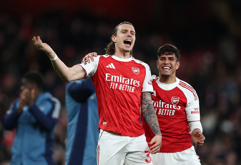 Riccardo Calafiori of Arsenal and Piero Hincapie of Arsenal celebrate victory during the Premier League match between Arsenal and Everton at Emirates Stadium on March 14, 2026 in London, England. (Photo by Alex Pantling/Getty Images)