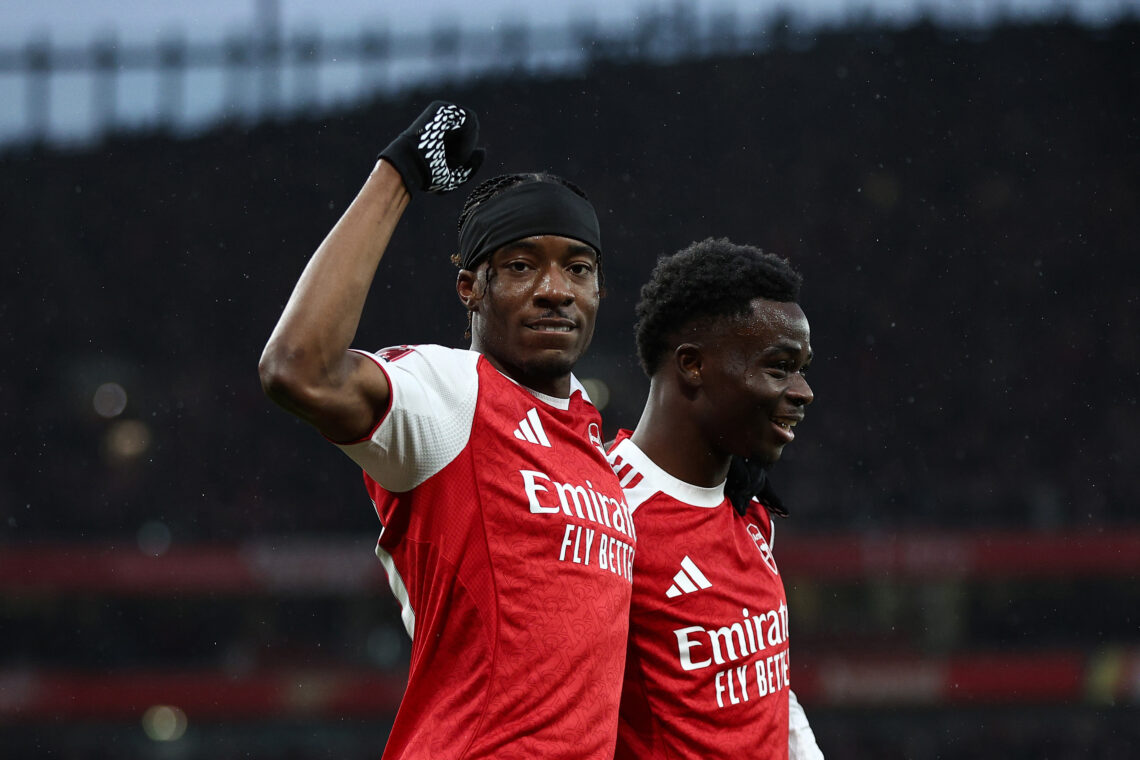 LONDON, ENGLAND - FEBRUARY 15: Noni Madueke of Arsenal celebrates with teammate Bukayo Saka after scoring his team's first goal during the Emirates...