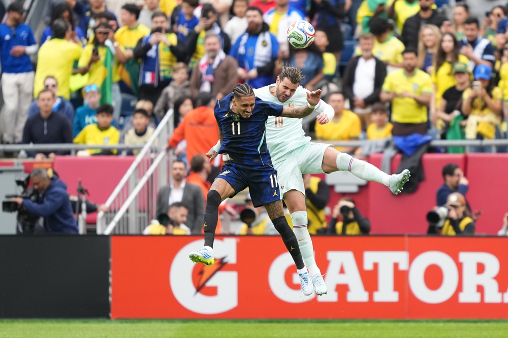 Injured Barcelona star to miss Champions League quarter & potential semi 3 Raphinha of Brazil heads the ball against Theo Hernandez of France during the international friendly match between Brazil and France at Gillette Stadium on March 26, 2026 in Foxborough, Massachusetts. (Photo by Michael Owens/Getty Images)