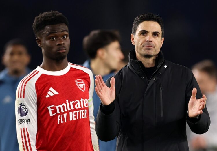 Mikel Arteta, Manager of Arsenal, applauds the fans as Bukayo Saka of Arsenal reacts following the Premier League match between Brighton & Hove Alb...